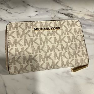 Michael Kors small logo zip around wallet in white and pink. New without tags.
